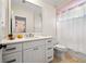 Bright bathroom with white cabinets, quartz countertops, and modern fixtures at 4620 Chattahoochee Se Xing, Marietta, GA 30067