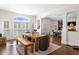 Open dining area featuring hardwood floors, elegant decor, and natural light at 4620 Chattahoochee Se Xing, Marietta, GA 30067