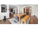 Bright dining area with hardwood floors, elegant decor, and seamless access to the kitchen at 4620 Chattahoochee Se Xing, Marietta, GA 30067