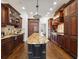 Gourmet kitchen boasts custom cabinets, granite countertops, and stainless steel appliances at 4620 Chattahoochee Se Xing, Marietta, GA 30067
