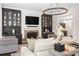 Inviting living room with custom cabinets, fireplace, and stylish decor at 4620 Chattahoochee Se Xing, Marietta, GA 30067