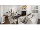 Comfortable living room with fireplace, white walls, and stylish decor at 4620 Chattahoochee Se Xing, Marietta, GA 30067