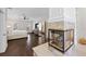 Spacious bedroom showcasing fireplace, hardwood floors, and ample natural light at 4620 Chattahoochee Se Xing, Marietta, GA 30067
