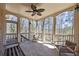 Enjoy the fresh air in this screened porch with wood floors and ceiling fan at 4620 Chattahoochee Se Xing, Marietta, GA 30067