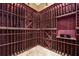 Wine cellar with extensive wooden racking for bottle storage and a climate-controlled environment at 4620 Chattahoochee Se Xing, Marietta, GA 30067