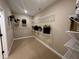 Walk-in closet with built-in shelving for storage and organization at 1601 Bonica Xing # 1601, Cumming, GA 30040