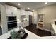Modern kitchen featuring stainless steel appliances, white cabinets, and quartz countertops at 1601 Bonica Xing # 1601, Cumming, GA 30040