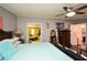 Spacious bedroom with ensuite bath and ceiling fan at 177 Carolyn Se Ct, Acworth, GA 30101
