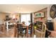 Open concept kitchen and dining area with stone fireplace at 177 Carolyn Se Ct, Acworth, GA 30101