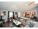 Cozy living room with wood-look flooring and views into dining area at 177 Carolyn Se Ct, Acworth, GA 30101