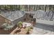 Aerial view of a home showcasing its roof, deck, and surrounding landscape at 2724 Janellen Dr, Atlanta, GA 30345