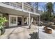 Outdoor patio with brick accents provides a grill and a table set for outdoor dining at 2724 Janellen Dr, Atlanta, GA 30345