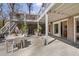 This outdoor patio includes a concrete patio, an open entertainment area, and stairs to an upper deck at 2724 Janellen Dr, Atlanta, GA 30345