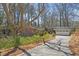 Charming home nestled among mature trees with a long driveway and a two-car garage at 2724 Janellen Dr, Atlanta, GA 30345