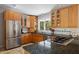 Bright kitchen with stainless steel appliances, granite countertops, and gas cooktop at 2724 Janellen Dr, Atlanta, GA 30345