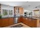 Well-lit kitchen with stainless steel appliances, granite countertops and custom cabinets at 2724 Janellen Dr, Atlanta, GA 30345
