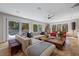 Bright living room with large windows, stylish furniture, and access to an outdoor deck at 2724 Janellen Dr, Atlanta, GA 30345