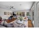 Bright living room with large windows, hardwood floors, and modern decor at 2724 Janellen Dr, Atlanta, GA 30345