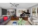 Spacious living room featuring hardwood floors and a grand piano at 2724 Janellen Dr, Atlanta, GA 30345