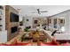 Open-concept living room with modern decor, a fireplace, and sliding door access to outside at 2724 Janellen Dr, Atlanta, GA 30345