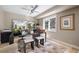 Office featuring neutral paint, tiled floor, modern desk with large mirror and a window at 2724 Janellen Dr, Atlanta, GA 30345