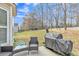 Green backyard with seating and a grill perfect for entertaining at 4145 Alveston Dr, Atlanta, GA 30349
