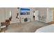 Open-concept bedroom featuring a TV, bar seating, and comfortable furnishings at 4145 Alveston Dr, Atlanta, GA 30349