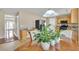 Dining area with wood table, bright windows, and views to the kitchen at 4145 Alveston Dr, Atlanta, GA 30349