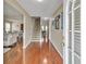 Bright entryway showcasing gleaming hardwood floors and an inviting staircase leading to upper levels at 4145 Alveston Dr, Atlanta, GA 30349