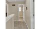 Hallway leading to various rooms, featuring neutral walls and plush carpet at 4145 Alveston Dr, Atlanta, GA 30349
