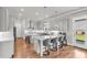 Bright kitchen featuring stainless steel appliances, a marble island, and wooden floors at 6210 Bellmoore Park Ln, Duluth, GA 30097