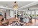 Open concept floorplan with a large living room, dining area, staircase, and gourmet kitchen at 6210 Bellmoore Park Ln, Duluth, GA 30097