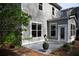 Backyard with tiled patio and green lawn, perfect for outdoor living at 1098 Central Park Rd, Decatur, GA 30033