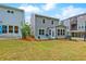 Backyard with patio and lush green lawn, perfect for outdoor entertaining and relaxing at 1098 Central Park Rd, Decatur, GA 30033