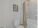 Bathroom with tiled shower, modern toilet, and neutral color at 1098 Central Park Rd, Decatur, GA 30033