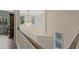 A landing at the top of the stairs has a view of the neighborhood and the stairs at 1098 Central Park Rd, Decatur, GA 30033