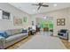 Living room boasts hardwood floors, neutral paint, ceiling fan and ample natural light at 1098 Central Park Rd, Decatur, GA 30033