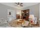 Elegant living room featuring a wooden desk, patterned rug, and cozy seating area at 1098 Central Park Rd, Decatur, GA 30033