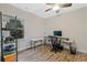 Bright office space with a large window, desk, and ceiling fan at 1098 Central Park Rd, Decatur, GA 30033