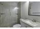 Modern bathroom showcasing a tiled walk-in shower, granite countertop, and updated fixtures at 2463 Corner Shoals Dr, Decatur, GA 30034