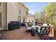 Spacious back deck featuring a grill and outdoor seating with wooded views at 4249 Millside Walk, Smyrna, GA 30080