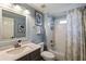 Charming bathroom with white tiled shower and blue walls at 4249 Millside Walk, Smyrna, GA 30080