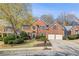 Beautiful brick home featuring a two-car garage and a well-manicured yard at 4249 Millside Walk, Smyrna, GA 30080