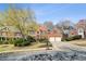 Beautiful brick home featuring a two-car garage and a well-manicured yard at 4249 Millside Walk, Smyrna, GA 30080