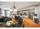 Open kitchen with a center island, stainless appliances, and seamless access to both dining and sitting areas at 4249 Millside Walk, Smyrna, GA 30080