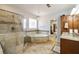 Bright main bathroom with corner tub and glass shower at 4249 Millside Walk, Smyrna, GA 30080