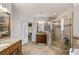 Bright bathroom with tile floor, cabinets and glass shower at 4249 Millside Walk, Smyrna, GA 30080