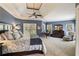 Spacious main bedroom with large windows and a ceiling fan at 4249 Millside Walk, Smyrna, GA 30080