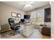 Comfortable home office featuring a modern desk, a leather chair, and natural light at 4249 Millside Walk, Smyrna, GA 30080