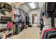 Spacious walk-in closet featuring extensive built-in shelving for optimal storage and organization at 4249 Millside Walk, Smyrna, GA 30080